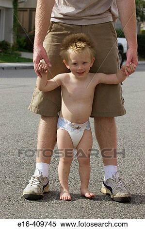 father and toddler standing together View Large Photo Image Stock Photography - father and toddler standing together. Fotosearch
