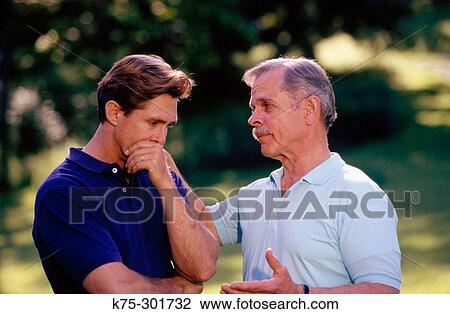 Father counseling his adult son View Large Photo Image Stock Image - Father counseling his adult son. Fotosearch