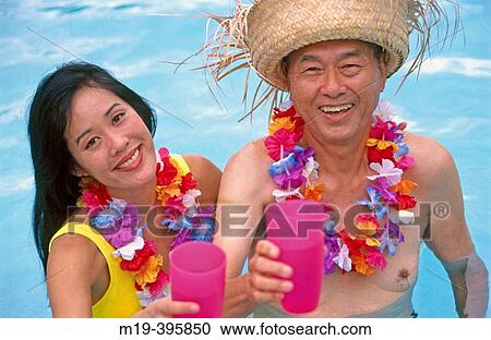 father & daughter on vacation in a swiming pool View Large Photo Image Stock Image - father & daughter on vacation in a swiming pool. Fotosearch