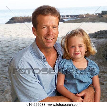 father holding daughter View Large Photo Image Stock Photo - father holding daughter. Fotosearch