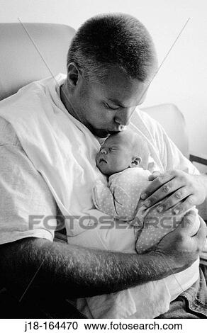 Father holding newborn View Large Photo Image Stock Image - Father holding newborn. Fotosearch
