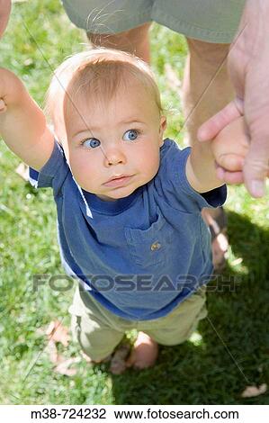 Father holding son. View Large Photo Image Stock Image - Father holding son.. Fotosearch