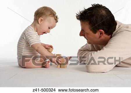 Picture - Father playing with his son. Fotosearch