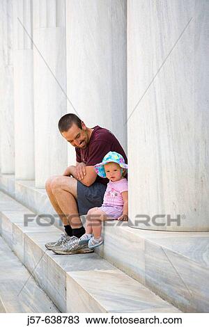 Father sitting with daughter in Athens. Greece. View Large Photo Image Stock Image - Father sitting with daughter in Athens. Greece.. Fotosearch