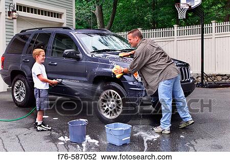 Father washing his car with son helping. View Large Photo Image Stock Image - Father washing his car with son helping.. Fotosearch