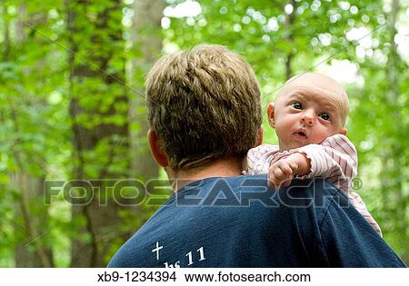Father with baby in forest View Large Photo Image Picture - Father with baby in forest. Fotosearch