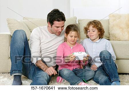 Father with children View Large Photo Image Stock Image - Father with children. Fotosearch