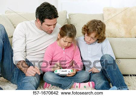 Father with children View Large Photo Image Stock Image - Father with children. Fotosearch