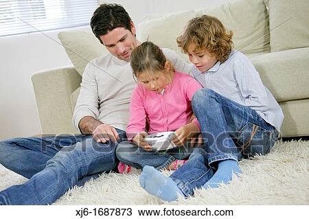 Father with children View Large Photo Image Stock Image - Father with children. Fotosearch
