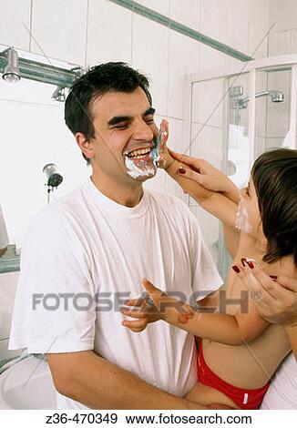Stock Photo - Father with daughter shaving. Fotosearch