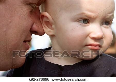 Father with his 1year old son View Large Photo Image Stock Photograph - Father with his 1year old son. Fotosearch