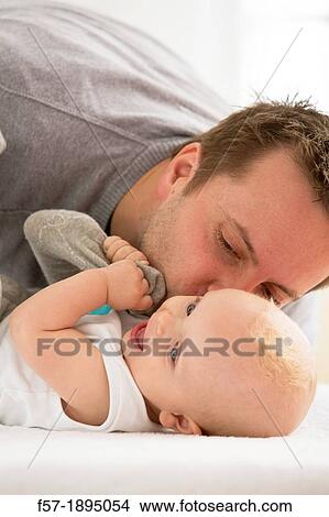 Father with his baby son View Large Photo Image Picture - Father with his baby son. Fotosearch