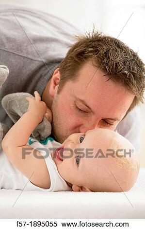 Father with his baby son View Large Photo Image Stock Photography - Father with his baby son. Fotosearch