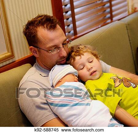 Father with newborn and three year old View Large Photo Image Stock Photography - Father with newborn and three year old. Fotosearch