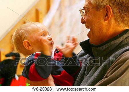 Father with one year old son View Large Photo Image Stock Image - Father with one year old son. Fotosearch