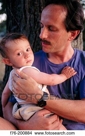 Father with young son View Large Photo Image Picture - Father with young son. Fotosearch