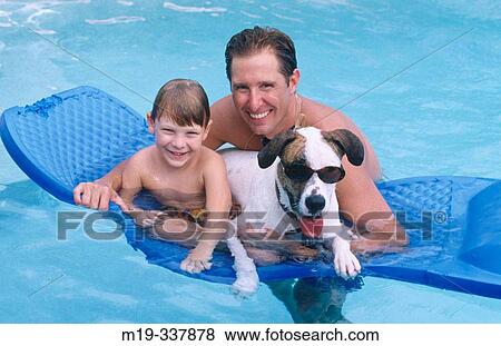 father/son with funny dog in the pool View Large Photo Image Stock Photo - father/son with funny dog in the pool. Fotosearch