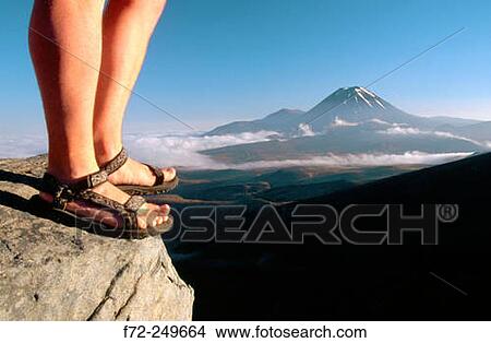 Feet and Mt. Ngauruhoe. Tongariro National Park, Central Plateau. North Island. New Zealand View Large Photo Image Picture - Feet and Mt. Ngauruhoe. Tongariro National Park, Central Plateau. North Island. New Zealand. Fotosearch