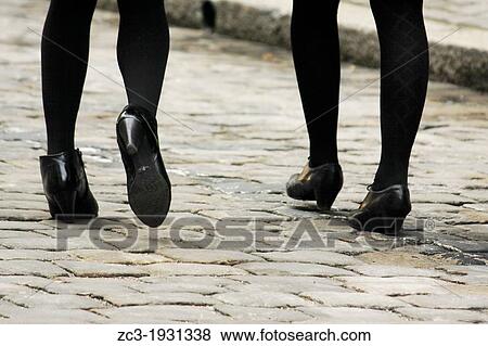 Feet and shoes of young women walking in the street, Geneva, Canton of Geneva, Switzerland. View Large Photo Image Stock Photo - Feet and shoes of young women walking in the street, Geneva, Canton of Geneva, Switzerland.. Fotosearch