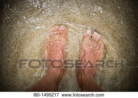 Feet in beach Cabo de Gata, Almeria, Spain View Large Photo Image Stock Photo - Feet in beach Cabo de Gata, Almeria, Spain. Fotosearch