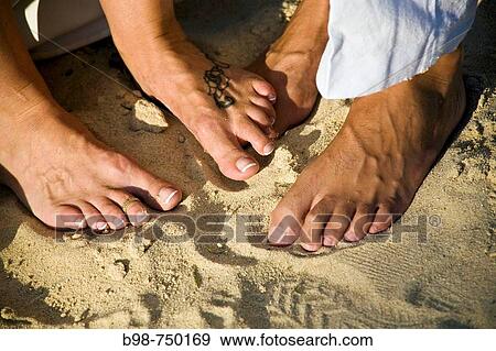 Feet in sand View Large Photo Image Stock Photo - Feet in sand. Fotosearch
