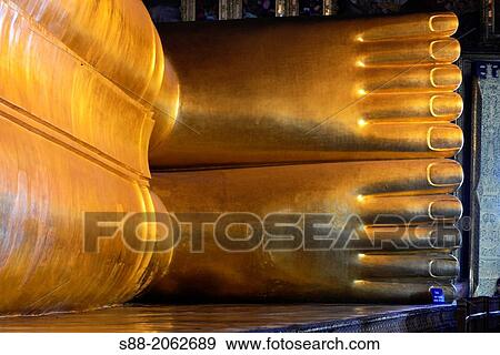 Feet of Reclining Buddha at Wat pho temple. It is one of the biggest temple situate next block to Royal Palace in Bangkok. View Large Photo Image Stock Photo - Feet of Reclining Buddha at Wat pho temple. It is one of the biggest temple situate next block to Royal Palace in Bangkok.. Fotosearch