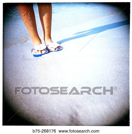Feet on the beach View Large Photo Image Stock Photograph - Feet on the beach. Fotosearch