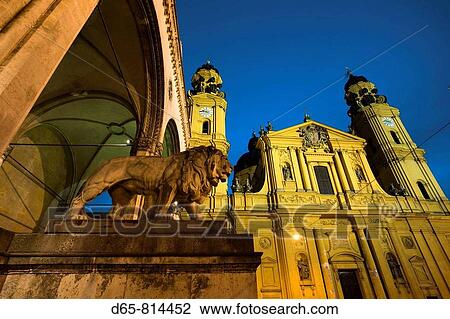 Stock Image - Feldherrnhalle and Theatinerkirche St. Katejan church in the evening, Munich, Bavaria, Germany. Fotosearch