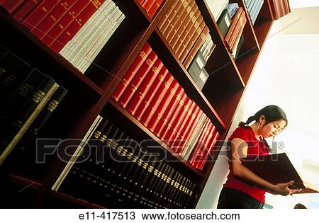 Female Asian college student in library. View Large Photo Image Stock Image - Female Asian college student in library.. Fotosearch