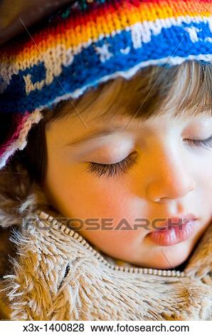 Female baby child with a colorful winter hat View Large Photo Image Stock Photo - Female baby child with a colorful winter hat. Fotosearch