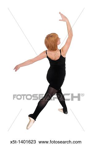 Female Ballet Dancer balances on her tows On white Background View Large Photo Image Stock Image - Female Ballet Dancer balances on her tows On white Background. Fotosearch