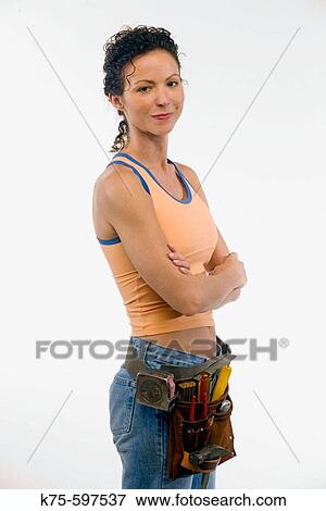 Stock Photo - female, caucasian, age 30's to 40? s, carpenter, workbelt, tools. Fotosearch
