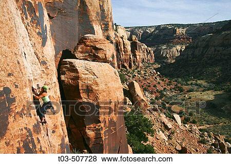 Female climber leading a crack climb in Indian Creek, Utah near Canyonlands National Park. USA View Large Photo Image Stock Photo - Female climber leading a crack climb in Indian Creek, Utah near Canyonlands National Park. USA. Fotosearch