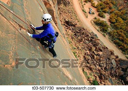 Female climber on route at the Ice Cream Parlor crag near Moab, Utah, USA View Large Photo Image Stock Image - Female climber on route at the Ice Cream Parlor crag near Moab, Utah, USA. Fotosearch
