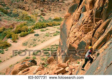 Female climber on route at the Ice Cream Parlor crag near Moab, Utah, USA View Large Photo Image Stock Image - Female climber on route at the Ice Cream Parlor crag near Moab, Utah, USA. Fotosearch