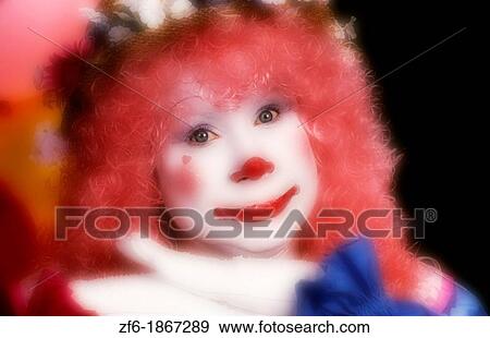 Stock Photo - Female clown Pink hair balloons. Fotosearch
