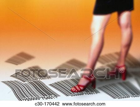 Stock Image - Female consumer with bar codes. Fotosearch