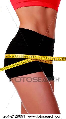 Female fitness model measuring volumes. View Large Photo Image Stock Image - Female fitness model measuring volumes.. Fotosearch