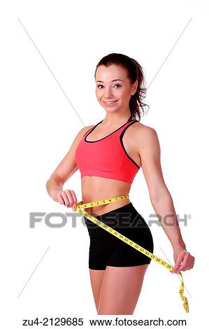 Stock Photography - Female fitness model measuring volumes.. Fotosearch