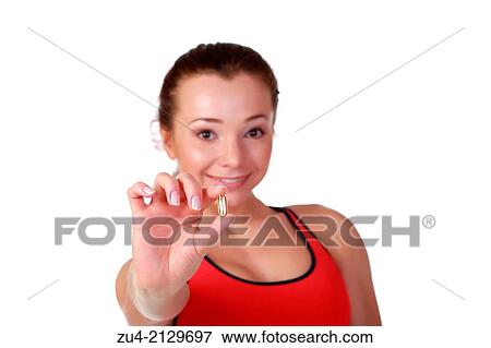 Female fitness model with Omega-3 acid pills. View Large Photo Image Stock Photo - Female fitness model with Omega-3 acid pills.. Fotosearch