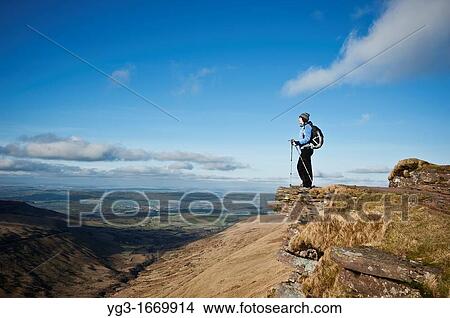 Female hiker on summit of Fan Y Big, Brecon Beacons national park, Wales View Large Photo Image Picture - Female hiker on summit of Fan Y Big, Brecon Beacons national park, Wales. Fotosearch