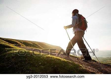 Female hiker on trail to Twmpa, Black Mountains, Brecon Beacons national park, Wales. View Large Photo Image Stock Image - Female hiker on trail to Twmpa, Black Mountains, Brecon Beacons national park, Wales.. Fotosearch