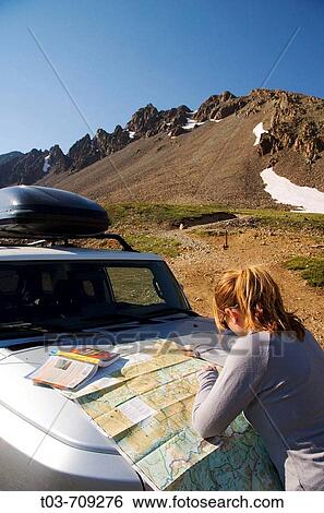 Female hiker planning a route up Mt Sneffels in the Sneffels Wilderness, San Juan Mountains, Colorado, USA View Large Photo Image Stock Photograph - Female hiker planning a route up Mt Sneffels in the Sneffels Wilderness, San Juan Mountains, Colorado, USA. Fotosearch