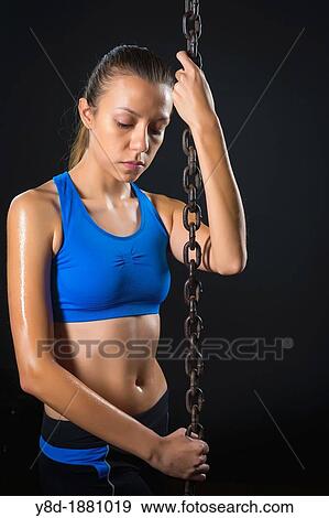 Female Hispanic 20, fitness workout concept with heavy duty chain View Large Photo Image Stock Photo - Female Hispanic 20, fitness workout concept with heavy duty chain. Fotosearch