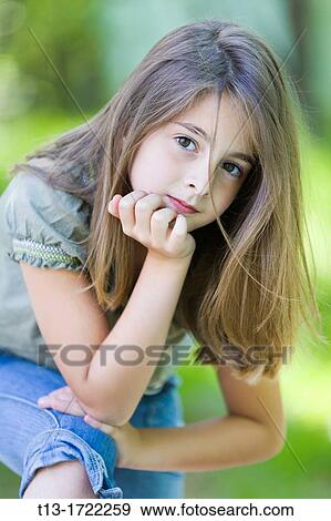 Stock Photo - Female kid is posing. Fotosearch