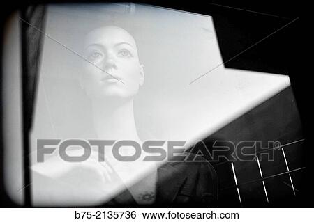 Female mannequin view through a glass with reflections, England, UK, Europe View Large Photo Image Stock Photograph - Female mannequin view through a glass with reflections, England, UK, Europe. Fotosearch
