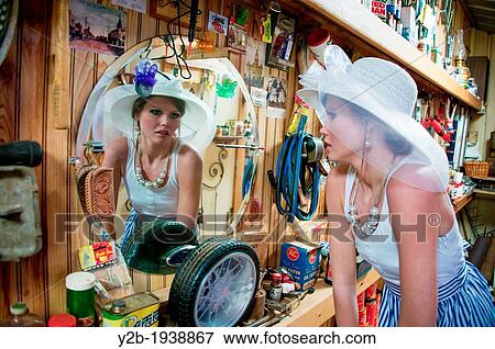 Female model in vintage service station View Large Photo Image Stock Photo - Female model in vintage service station. Fotosearch
