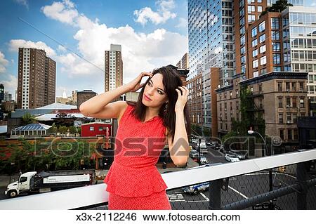 Female model posing in the streets of New York. USA. View Large Photo Image Stock Photograph - Female model posing in the streets of New York. USA.. Fotosearch