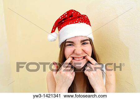 female santa portrait looking cute and funny indoors closeup View Large Photo Image Stock Image - female santa portrait looking cute and funny indoors closeup. Fotosearch
