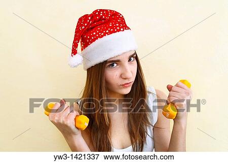 female santa portrait looking cute and funny indoors closeup View Large Photo Image Stock Photo - female santa portrait looking cute and funny indoors closeup. Fotosearch